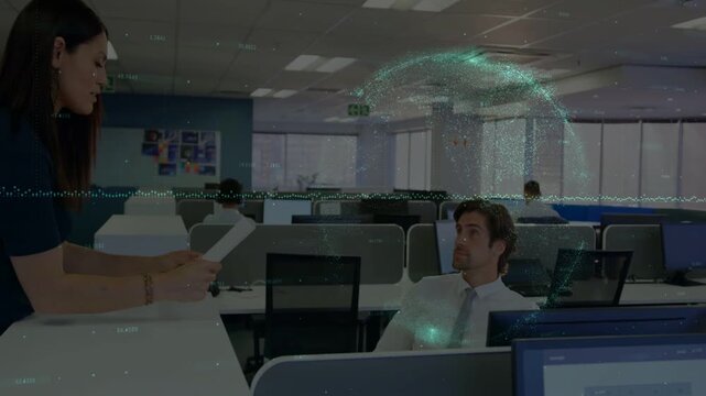 Woman coming to desk showing papers, man turning and listening, hologram annotating business papers