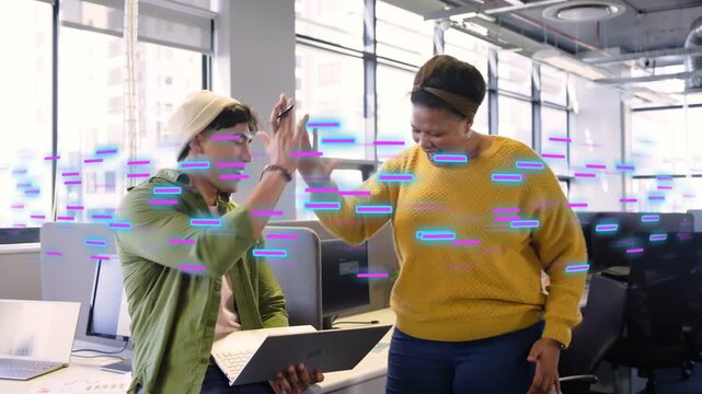 Man typing on laptop woman leaning in editing design while purple-blue glitch bars obscuring frames