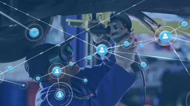 Vertical video: Female auto tech using tool under car, blue node appearing and mapping diagnostics