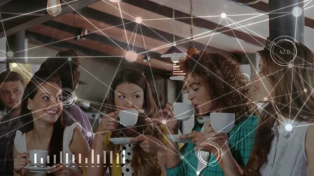 Cam revealing four women sharing coffee in cafe, chatting while data overlay animating over group