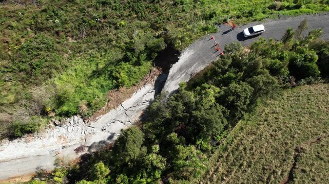 How cyclones and extreme weather events are affecting New Zealand Island roads in the Pacific Ocean.