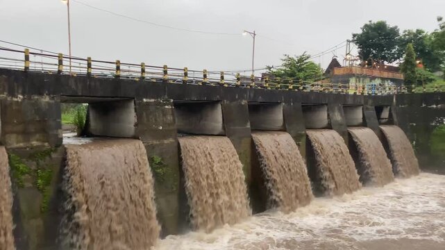 River Flow from Mount Merapi Volcanic Area Passing Sabo Dam in Indonesia 