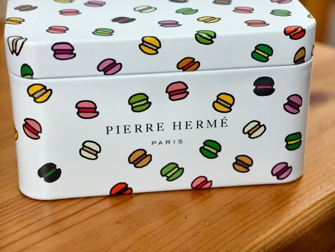 Shanghai,China-Otc.19th 2025: Close-up of Pierre Herm&eacute; Paris tin box with macaron illustrations