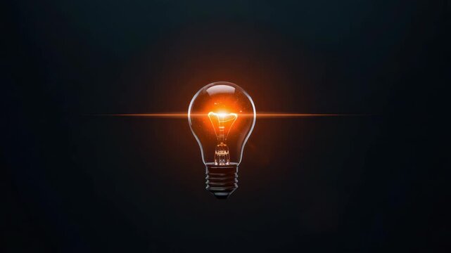 Glowing incandescent bulb with filament glow, warm orange light, horizontal lens flare