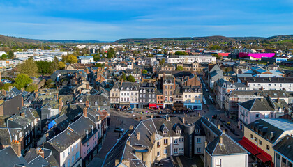 Obraz premium Aerial view of the Victor Hugo Square in the bustling historic center with traditional half-timbered architecture in Pont-Audemer, Normandy, France