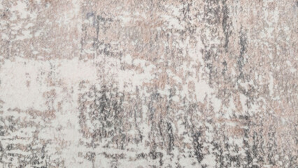 Fototapeta premium Abstract textured surface with distressed pattern featuring light and dark.