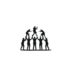 Obraz premium People silhouette forming a human pyramid by standing on each other to demonstrate vertical growth and the importance of a solid foundation for reaching high corporate goals and ambitions.