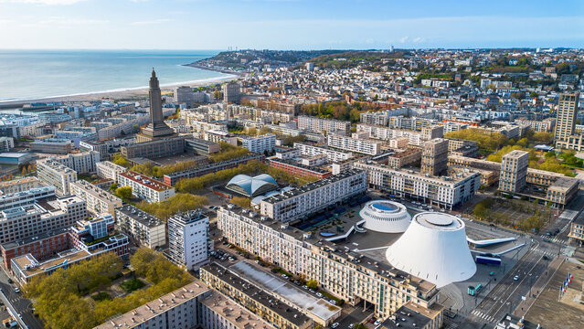 Aerial panorama of Le Volcan by Oscar Niemeyer and St. Joseph Church, modern architecture contrast in Le Havre city center, Normandy, France