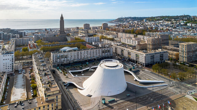 Aerial panorama of Le Volcan by Oscar Niemeyer and St. Joseph Church, modern architecture contrast in Le Havre city center, Normandy, France