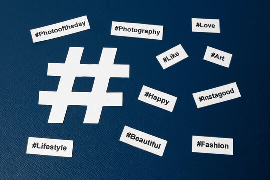Popular hashtags printed with sign on paper and on the blue background