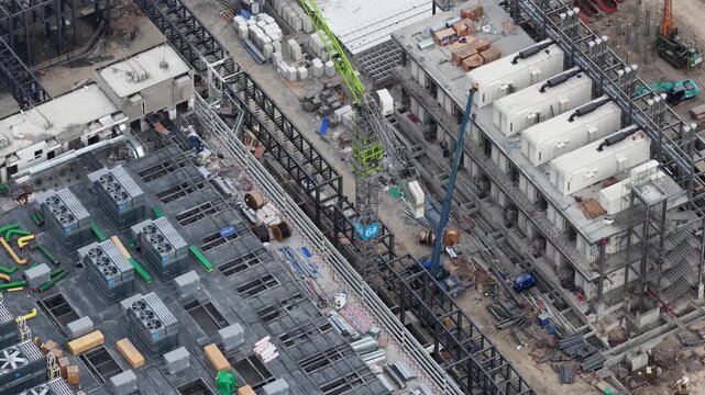 Aerial drone video of massive hyperscale data center construction near Bangkok, Thailand, featuring AI technology, cloud computing infrastructure, and rapid digital expansion.