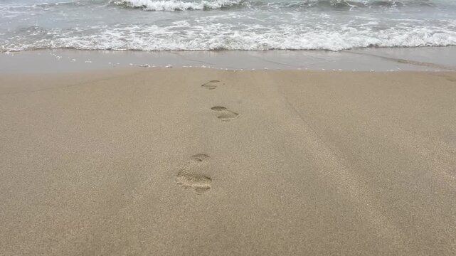 footprints on the beach