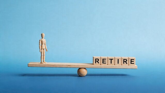 Minimalist wooden mannequin figure standing on balance beam scale next to blocks spelling RETIRE word conceptual image for retirement planning financial security life stage work