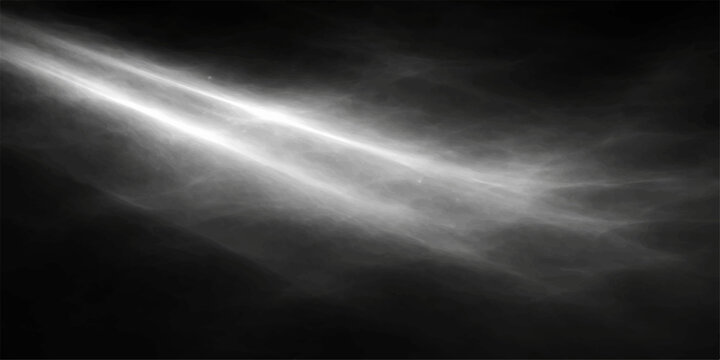 Abstract light background with rays of sun filtering through blue clouds and mist over a dark stormy sea