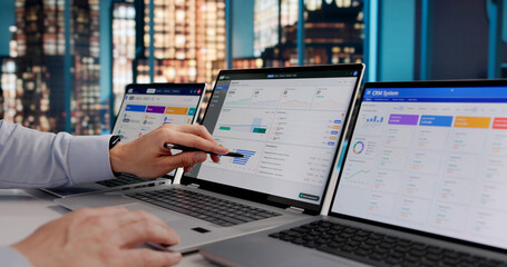 Hispanic ERP Expert Evaluating Cloud-Based CRM And Marketing Software © Andrey Popov