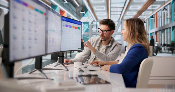 Two Software Developers Collaborate On CRM Functionality