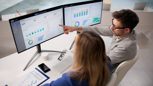 Corporate Manager Engaging Team With Advanced ERP Software For Financial