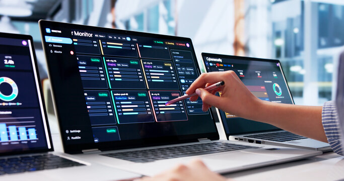 Young Woman Monitors Network Performance