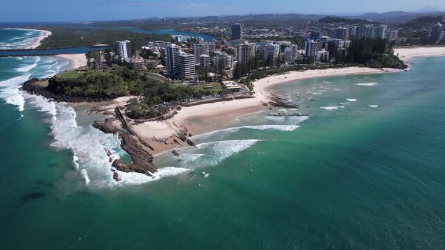 Coastal City Along Rainbow Beach And Snapper Rocks In Coolangatta, Queensland, Australia. Aerial Pullback Shot