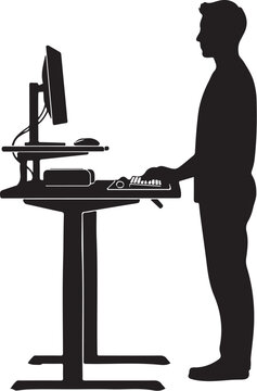 Standing man working on computer at desk standing desk