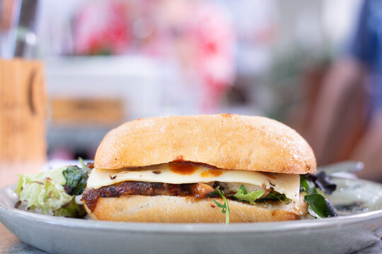 brekky bun, egg bacon cheese on a toasted bread roll