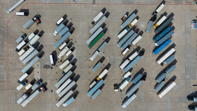 Aerial view of semi trucks parking at distribution center
