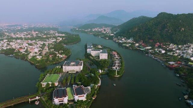 Aerial 4K view of winding Cai River with tropical coconut palms in Nha Trang near po nagar cham temple, Vietnam
the natural beauty of Central Vietnam&rsquo;s river systems