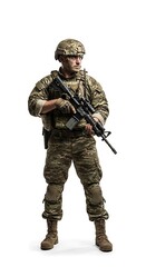Fototapeta premium Soldier stands alert in full camouflage gear