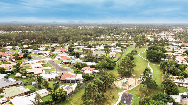 aerial view of Moreton Bay suburbs looking towards the Glasshouse Mountains