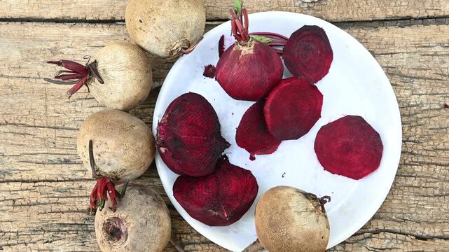 Fresh sliced beetroot on wooden surface. fresh beetroot on wooden background