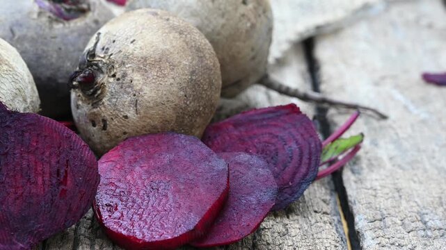 Fresh sliced beetroot on wooden surface. fresh beetroot on wooden background