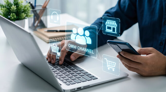 Omnichannel retail concept with businessman using laptop and smartphone to manage customer experience and digital marketing