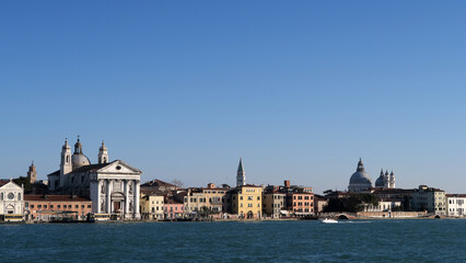 Venice, Italy. The Rio di Ca' Foscari is approximately 300 meters long. It opens onto the Grand Canal, Venice, Italy. It passes under the Ca' Foscari bridge. © Andreia