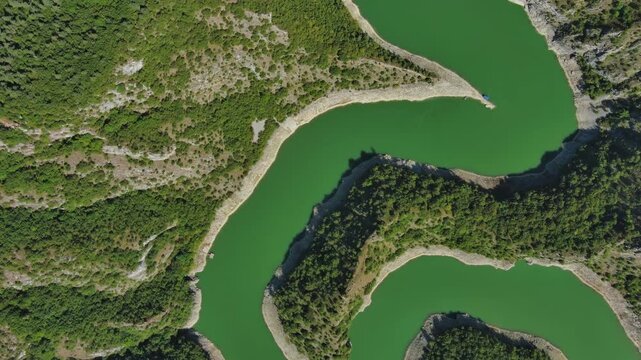 Aerial top view of curved meanders in canyon of Uvac river, Serbia, 4k