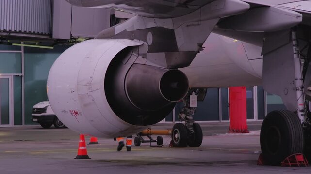 Airplane jet aircraft engine technic man inspection, Airport terminal technician worker man airline maintenance ground crew aircraft. Safety.