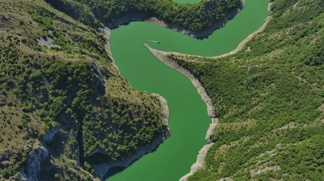 Aerial top view of curved meanders in canyon of Uvac river, Serbia, 4k