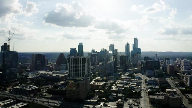 Aerial view of cars commuting along Interstate 35 through the heart of Austin, Texas.
