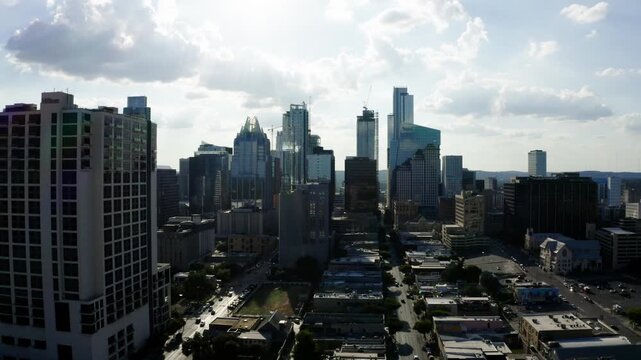 Drone shot pulling away from the Austin, Texas downtown skyscrapers.