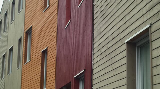 A static view of the horizontal and vertical wood siding in the town of Krager&oslash;, in Telemark, southern Norway