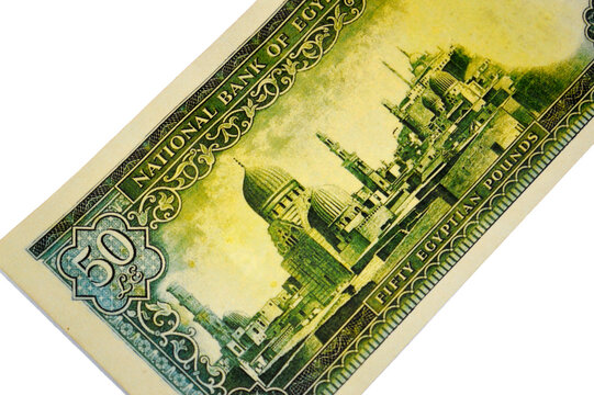 the reverse side of an old 50 Egyptian Pound banknote, during the reign of King Farouk I, Issued by National Bank of Egypt, features a panorama of historic Cairo, with various mosques and minarets