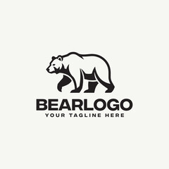 Obraz premium Stylized bear logo template with a walking grizzly bear silhouette and generic text on a clean background, isolated vector illustration design element.