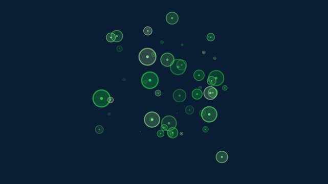 Abstract footage of purple glowing circles and bubbles drifting and fading on a dark blue background, creating a soft bokeh effect for modern tech and design backdrops