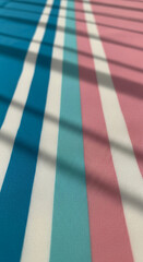 Obraz premium Close-up on a striped fabric surface in blue, white, and pink hues, showing linear pattern with shadows, representing modern texture and design