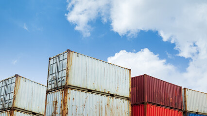 Fototapeta premium Cargo ship container goods export import international transport on blue sky background, warehouse industry business logistics transportation harbor port industrial shipping terminal cargo ship.