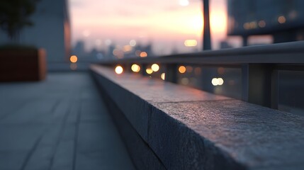 Obraz premium A cinematic view of a modern city skyline at dusk framed over a smooth concrete railing with beautiful bokeh light effects