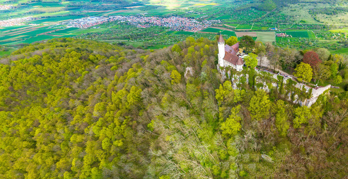A flight above Kirchheim Teck towards the Castle Teck which is located high above the mountain 
