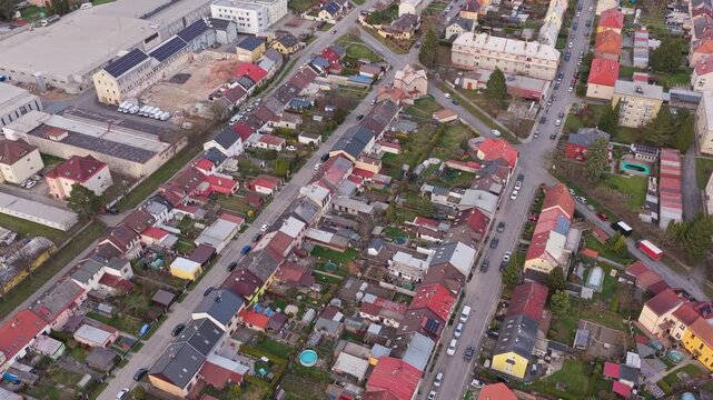 Aerial view of residential houses in Svitavy small town district.
Drone shot of real estate and neighborhood living.