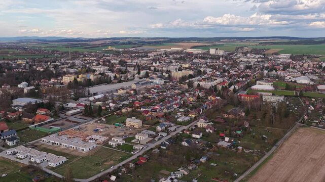 A panoramic view of the town of Svitavy, featuring single-family homes and residential properties. A view from a drone