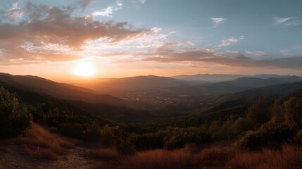 Obraz premium A panoramic view of rolling hills at sunset capturing the warm glow of sunlight filtering through dramatic layered clouds