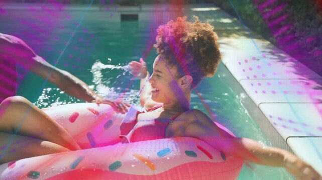 Woman on pink donut float reacting as man nudging, friend tossing beach ball, creating marketing